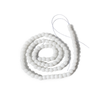 White Porcelain Bead Strand (Synthetic) 15" - 4mm Faceted from Stonebridge Imports