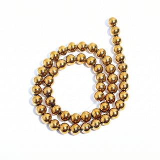 Gold Hematite Bead Strand (Enhanced) from Stonebridge Imports