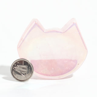 Rose Quartz Aura-Plated Cat Head Bowl beside a Canadian dime for scale, showing the pink quartz dish at about 1 1/2 inches wide, on a clean white background. Stonebridge Imports.