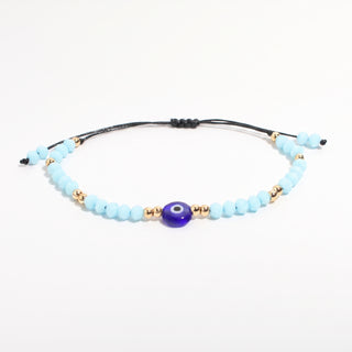 Evil Eye Bracelet with Coloured Beads and Cord - Adjustable Light Blue and Gold from Stonebridge Imports