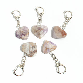 Amethyst Chevron Heart Charm - Pack of 5 - five polished banded chevron amethyst hearts, each on its own silver-tone swivel clasp, arranged on a clean white background. Stonebridge Imports.