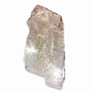 Selenite Window Slab Unique #22 - 30", a thick broad slab with salmon and rust crust along the top edge and white fibrous banding, photographed on a clean white background. Stonebridge Imports.