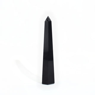 #5 - 150g to 249.9g — Black Obsidian Generator, polished six-sided tower with a faceted point, photographed on a clean white background. Stonebridge Imports.