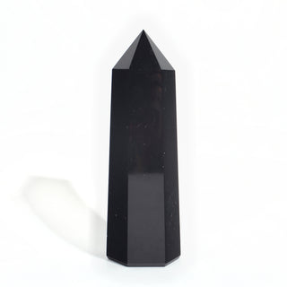 Black Obsidian Generator Unique #11 — polished six-sided tower with a faceted point, seen from a second angle, photographed on a clean white background. Stonebridge Imports.