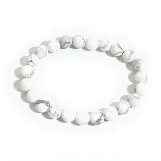 Take a Breath: white with grey veining howlite 8mm bead stretch bracelet from the Intention Bracelet Display Kit, on a clean white background. Stonebridge Imports.