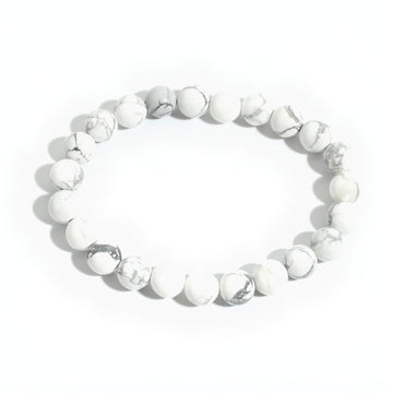 Take a Breath: white with grey veining howlite 8mm bead stretch bracelet from the Intention Bracelet Display Kit, on a clean white background. Stonebridge Imports.