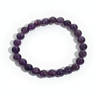 Quiet Mind: deep purple amethyst 8mm bead stretch bracelet from the Intention Bracelet Display Kit, on a clean white background. Stonebridge Imports.