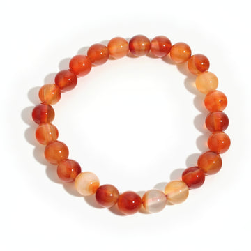 Find Your Fire: orange-red carnelian 8mm bead stretch bracelet from the Intention Bracelet Display Kit, on a clean white background. Stonebridge Imports.