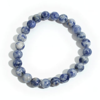 Trust Yourself: deep blue and white sodalite 8mm bead stretch bracelet from the Intention Bracelet Display Kit, on a clean white background. Stonebridge Imports.