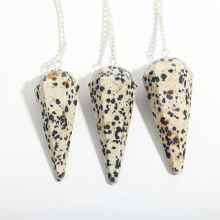 Dalmatian Jasper Pendulum 6 Facet & Bead - 3 Pack, three spotted Dalmatian jasper pendulums hanging side by side on a clean white background. Stonebridge Imports.