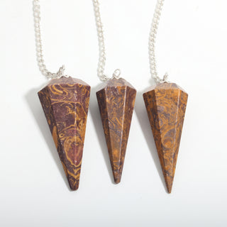 Snake Jasper Pendulum 6 Facet & Bead - 3 Pack, three swirled snake jasper pendulums hanging side by side on a clean white background. Stonebridge Imports.