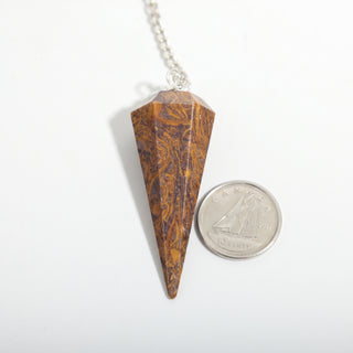 Snake Jasper Pendulum 6 Facet & Bead - 3 Pack, one swirled snake jasper pendulum beside a dime for scale, on a clean white background. Stonebridge Imports.
