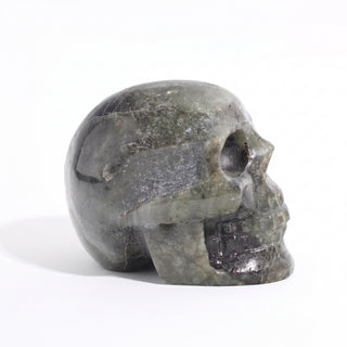 Labradorite Skull Carving Unique #5, alternate angle photographed on a clean white background. Stonebridge Imports.
