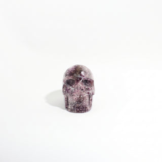 Lepidolite Skull Carving Unique #9, photographed on a clean white background. Stonebridge Imports.