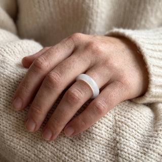 Clear Quartz Ring worn on the hand in natural light, showing the solid clear quartz band at true scale.