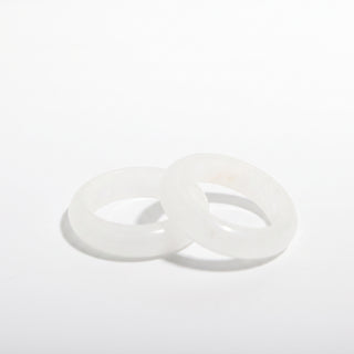 Clear Quartz Ring — solid clear quartz stone band ring, photographed on a clean white background. Stonebridge Imports.