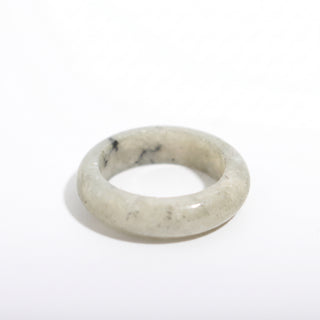Labradorite Ring — solid grey labradorite with blue flash stone band ring, alternate angle photographed on a clean white background. Stonebridge Imports.