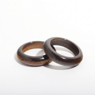 Tiger Eye Ring — solid golden-brown banded tiger eye stone band ring, photographed on a clean white background. Stonebridge Imports.