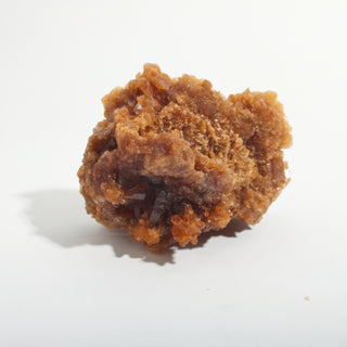 2" — Natural Citrine - Morocco, a rounded orange-brown cluster with a sugary crystalline centre and darker crystal edges, photographed on a clean white background. Stonebridge Imports.