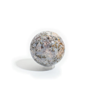 Sea Jasper Sphere Unique #1, a polished 3 1/2" ocean jasper sphere patterned with creamy white, pale blue-grey, rust-orange and olive-green orbs, photographed on a clean white background. Stonebridge Imports.