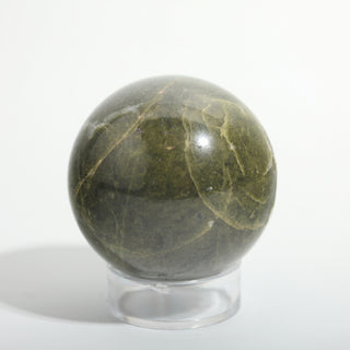 Small #1 — Vessonite Sphere, deep olive green with lighter green and gold veining, photographed on a clean white background. Stonebridge Imports.