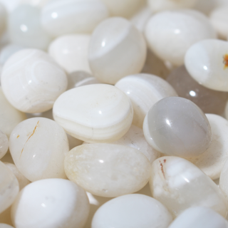 White Banded Agate Tumbled Stones from Stonebridge Imports