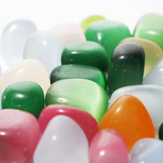 Cat's Eye Tumbled Stones (Synthetic) from Stonebridge Imports