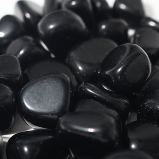 Black Obsidian Tumbled Stones - India from Stonebridge Imports