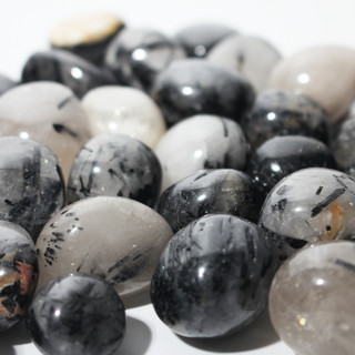 Tourmalinated Quartz Tumbled Stones from Stonebridge Imports