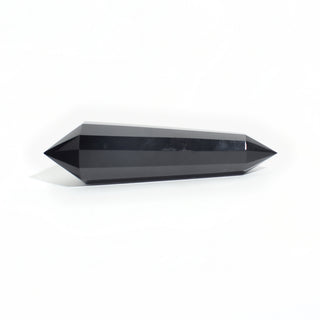 Black Obsidian Vogel Wand - 6" — double-terminated wand with six polished lengthwise faces and a sharpened point at each end, photographed on a clean white background. Stonebridge Imports.