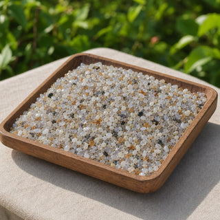 Agate Blue Lace B Crushed Stones - Super Tiny in a wooden tray at a market stall