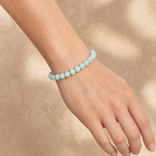 Amazonite bead bracelet worn on the wrist, close-up