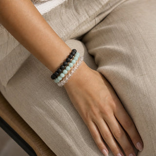 Amazonite bead bracelet stacked with other bead bracelets on the wrist