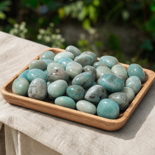 Amazonite with Smoky Quartz Tumbled Stones in a wooden tray at a market stall