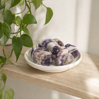 Amethyst Chevron A Tumbled Stones in a stoneware dish on a shop shelf
