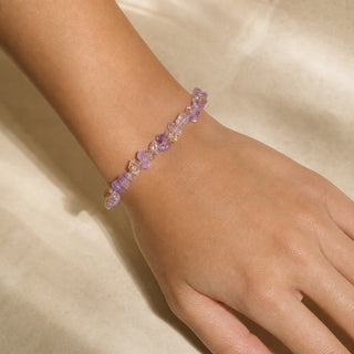 Ametrine bead bracelet worn on the wrist, close-up