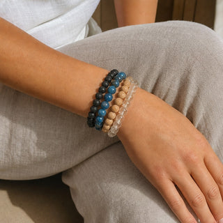 Blue Apatite bead bracelet stacked with other bead bracelets on the wrist