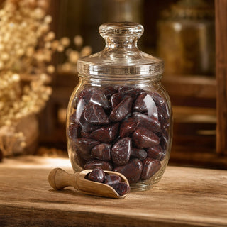 Cataclasite Tumbled Stones in a glass apothecary jar with a scoop