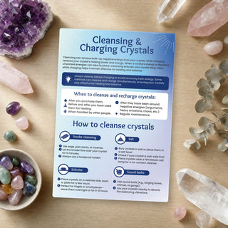 Cleansing and Charging Crystals QuickStudy Guide laid out with crystals and props