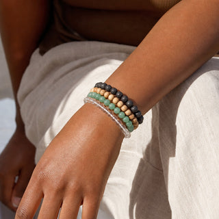 Green Aventurine bead bracelet stacked with other bead bracelets on the wrist