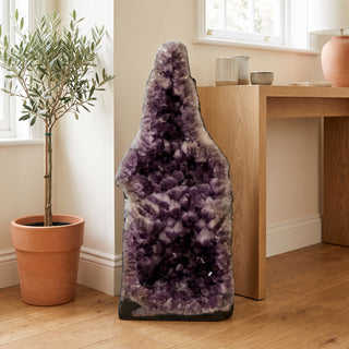 Amethyst Cathedral U#182 - 82 kg displayed in a warm modern home