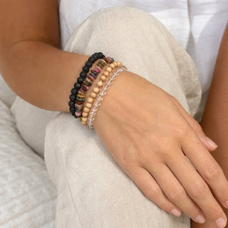 Multi-Colour Tourmaline bead bracelet stacked with other bead bracelets on the wrist