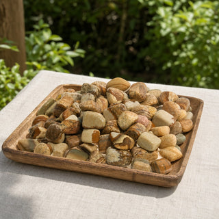 Picture Jasper Tumbled Stones in a wooden tray at a market stall