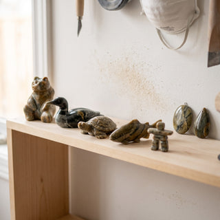 3x3x5 Carving Block - finished soapstone carvings on a shelf