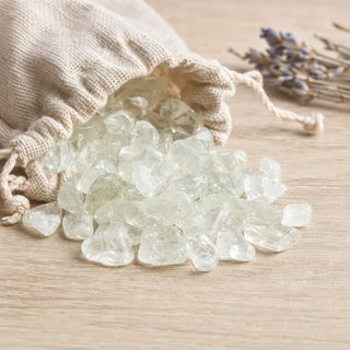 Prasiolite A Tumbled Stones - Semi-Polished spilling from a linen pouch