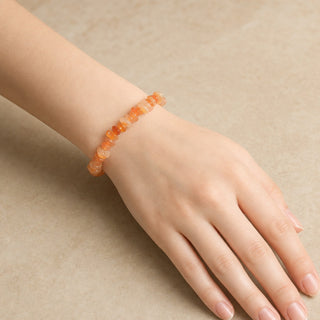 Red Aventurine bead bracelet worn on the wrist, close-up