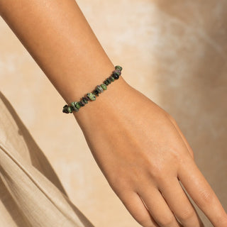 Ruby Zoisite bead bracelet worn on the wrist, close-up