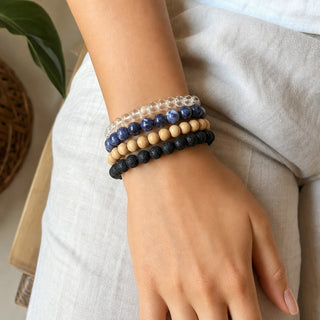Sodalite bead bracelet stacked with other bead bracelets on the wrist