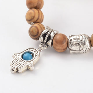 Wood Bead Bracelet with Buddha and Hamsa Charm    from Stonebridge Imports